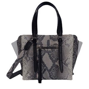 J. Markell Genuine python wing tip tote with a reversible crossbody stra…